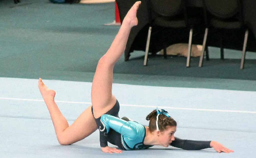 India Peel does a floor routine at the state championships in gymnastics.